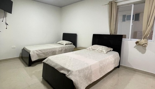 Habitación cuádruple clásica, vistas al jardín