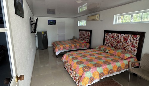 Habitación superior, 2 camas dobles, vistas al mar
