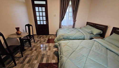 Habitación con 2 camas individuales