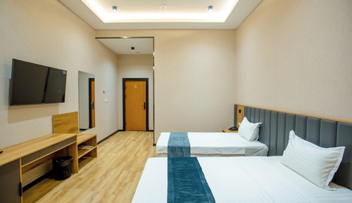 Habitación Confort con 1 cama doble o 2 individuales