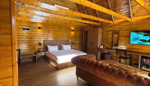 Habitación cuádruple ejecutiva, vistas al jardín