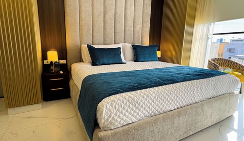 Habitación Deluxe, bañera de hidromasaje, vistas a la ciudad