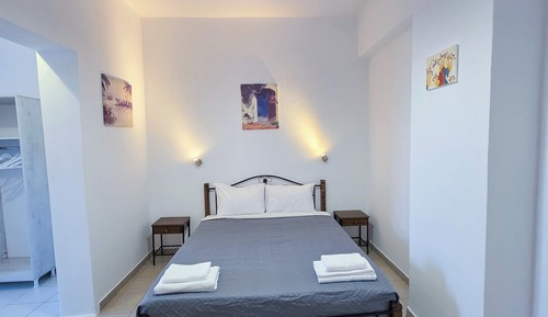 Habitación triple Deluxe, vistas parciales al mar