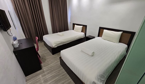 Habitación con 2 camas individuales
