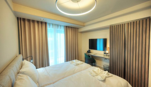 Habitación ejecutiva con 1 cama doble o 2 individuales, balcón