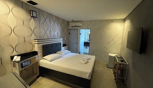 Suite Deluxe, 1 cama de matrimonio, no fumadores, Aire acondicionado