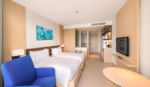 Habitación Deluxe con 2 camas individuales, balcón, vistas al mar