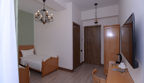 Habitación Deluxe con 1 cama doble o 2 individuales, vistas a la ciudad