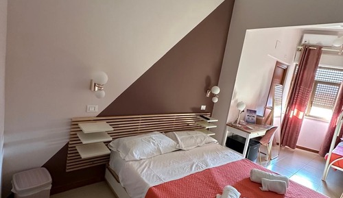 6 Comfort Quadruple Room, City View