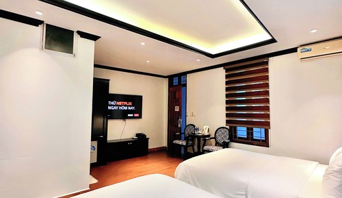 Habitación cuádruple Deluxe, vistas a la ciudad