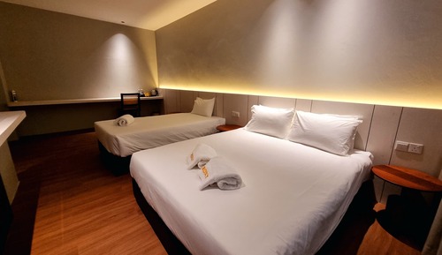Habitación triple Deluxe, vistas a la ciudad