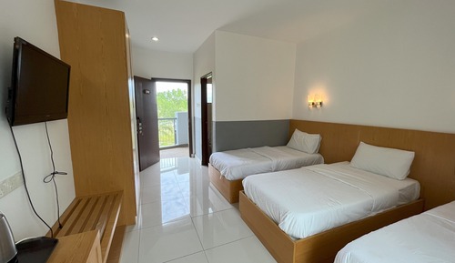 Habitación triple Deluxe, vistas al jardín