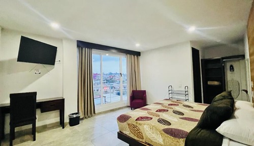 Habitación junior, balcón, vistas a la ciudad