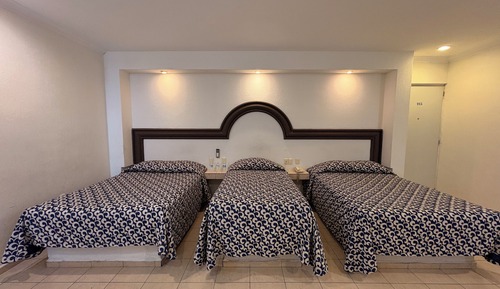 Habitación triple clásica, varias camas