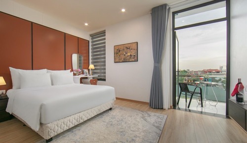 Habitación Deluxe con 1 cama doble o 2 individuales, balcón