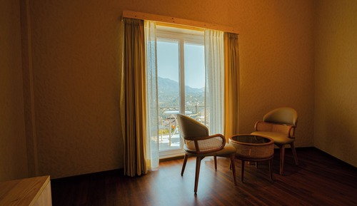 Luxury Suite with Private Balcony and Mountain View
