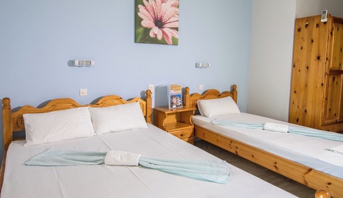 Habitación triple, vistas al mar