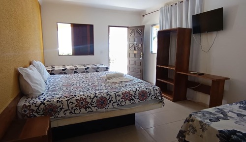 Habitación cuádruple, vistas a la playa