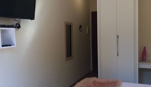 Habitación económica con 1 cama doble o 2 individuales, balcón, vistas al jardín
