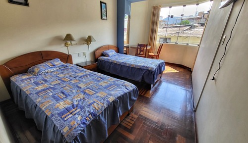 Habitación con 2 camas individuales