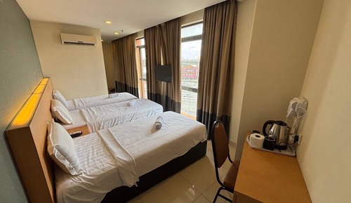 Habitación triple Deluxe