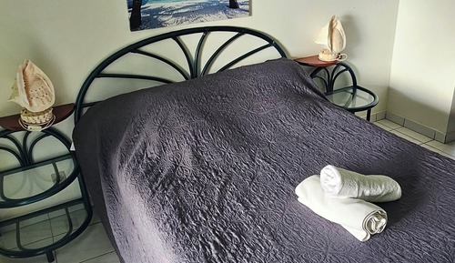 Suite estudio familiar, 2 camas individuales, vistas al mar