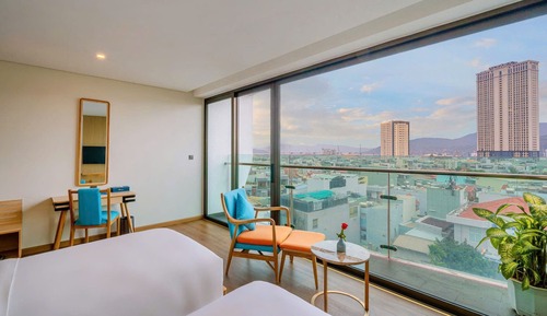 Habitación Deluxe con 2 camas individuales, vistas parciales al mar