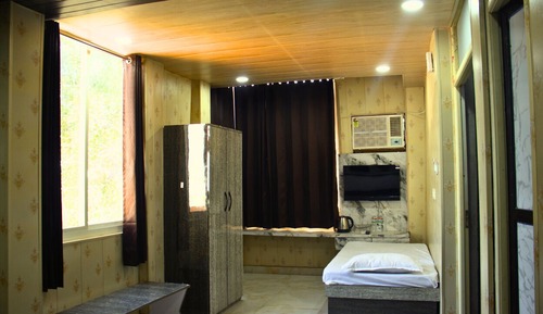 Habitación triple Deluxe
