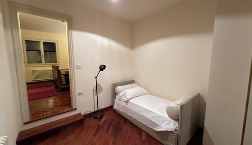 Habitación cuádruple, varias camas