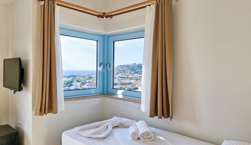 Habitación triple, balcón, vistas al mar