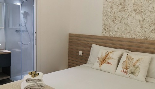 Habitación triple familiar, vistas al jardín