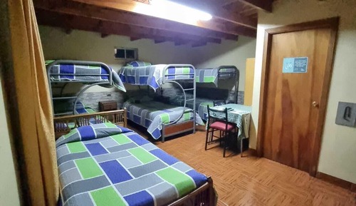 Habitación superior, varias camas