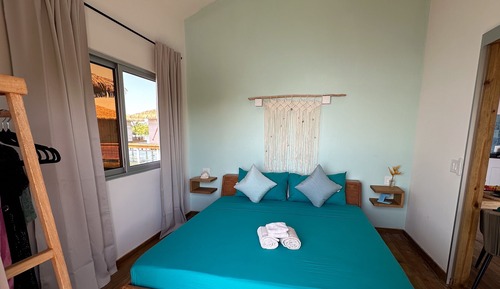 Bungalow exclusivo, 1 cama de matrimonio grande, cocina básica, vistas al mar