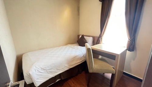 Habitación triple familiar, vistas a la ciudad (Family 2 Bedroom)
