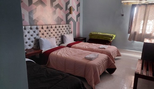 Habitación con 2 camas individuales