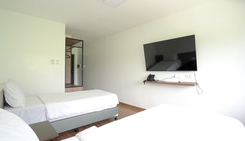 Habitación Deluxe con 1 cama doble o 2 individuales