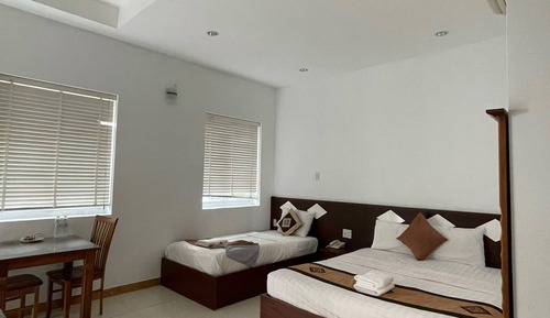 Habitación triple Deluxe, vistas al jardín