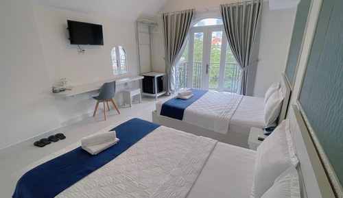 Habitación Deluxe con 1 cama doble o 2 individuales