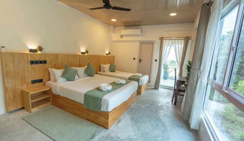 Habitación triple Deluxe, vistas al mar