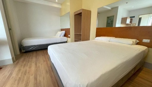 Habitación familiar con 2 camas individuales, vistas a la ciudad