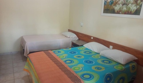 Habitación triple superior, varias camas
