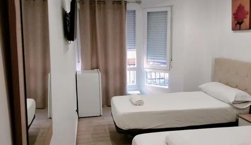 Habitación con 2 camas individuales