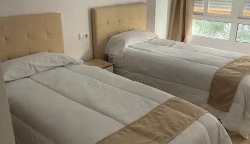 Habitación con 2 camas individuales