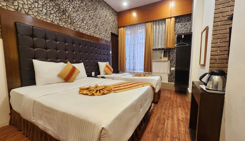 Habitación triple Deluxe, vistas a la ciudad