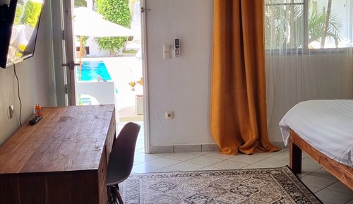 Habitación Deluxe con 1 cama doble o 2 individuales, vistas a la piscina