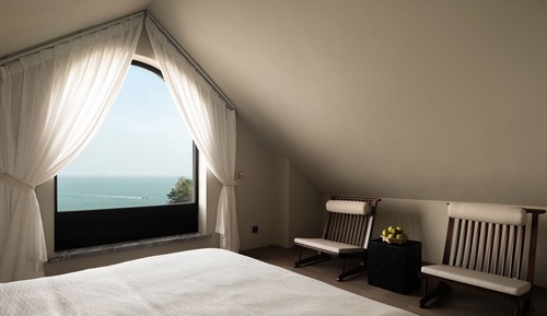 Habitación Signature doble, patio, vistas al mar