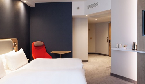 Suite, 1 cama de matrimonio, cocina básica, en esquina