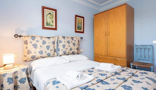Habitación con 1 cama doble o 2 individuales, vistas al jardín, frente a la playa