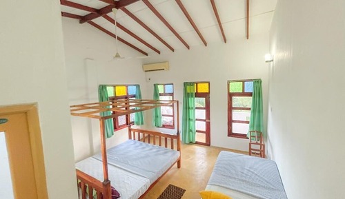 Habitación triple, vistas a la playa