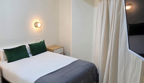 Habitación triple, vistas a la ciudad
